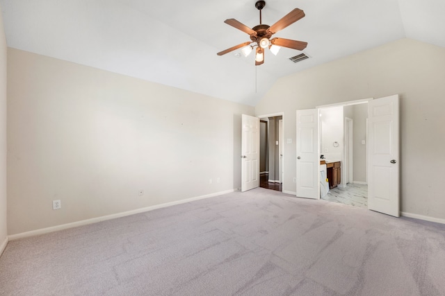 10446 Antelope Aly, Missouri City, TX 77459 - unfurnished bedroom with vaulted ceiling, light colored carpet, baseboards, connected bathroom, and ceiling fan