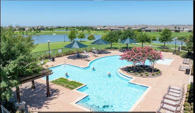 20763 Sunseed Dr, Richmond, TX 77407 - community pool featuring fence, a patio area, a water view, and a residential view