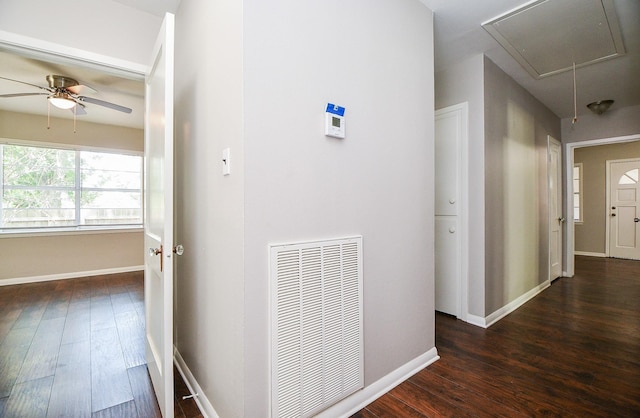 1225 Kirsten St, Galveston, TX 77568 - hall featuring attic access, dark wood-type flooring, and baseboards