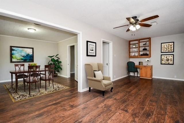 1225 Kirsten St, Galveston, TX 77568 - living area featuring wood finished floors, ceiling fan, baseboards, and ornamental molding