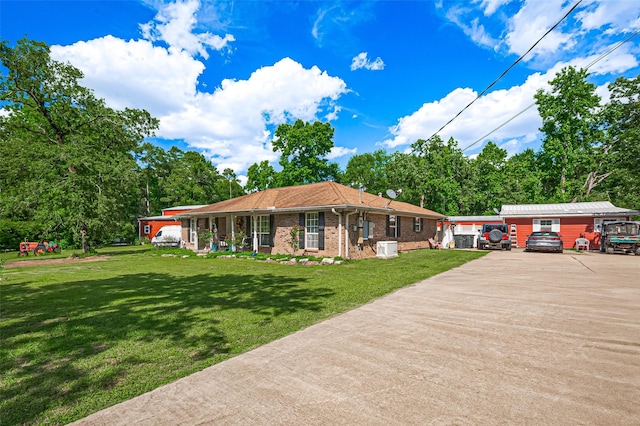 30926 Hilltop Ln, Magnolia, TX 77354 - view of front of house with a front lawn and brick siding
