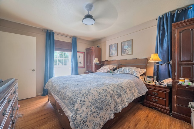 30926 Hilltop Ln, Magnolia, TX 77354 - bedroom featuring light wood finished floors and ceiling fan