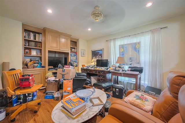 30926 Hilltop Ln, Magnolia, TX 77354 - home office with wood finished floors and recessed lighting