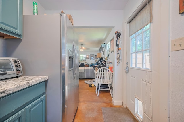 30926 Hilltop Ln, Magnolia, TX 77354 - corridor with finished concrete flooring and plenty of natural light