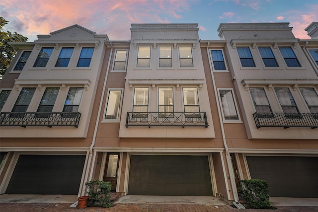 3302 Audley St Unit 110, Houston, TX 77098 - multi unit property with stucco siding, a garage, and driveway