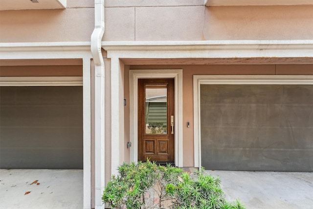 3302 Audley St Unit 110, Houston, TX 77098 - doorway to property featuring an attached garage