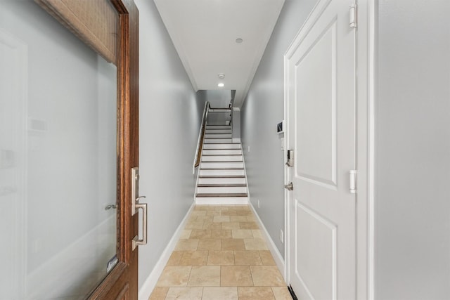3302 Audley St Unit 110, Houston, TX 77098 - hall with baseboards, stone finish floors, stairs, and recessed lighting