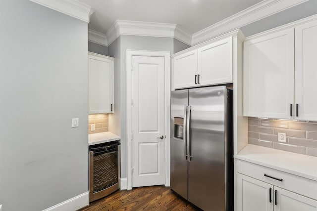 3302 Audley St Unit 110, Houston, TX 77098 - kitchen featuring stainless steel fridge with ice dispenser, beverage cooler, tasteful backsplash, white cabinets, and ornamental molding