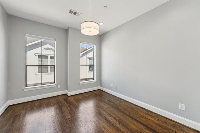 3302 Audley St Unit 110, Houston, TX 77098 - unfurnished room with baseboards and wood finished floors