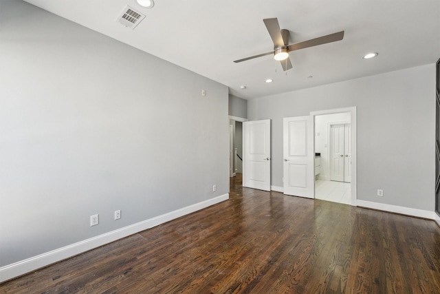 3302 Audley St Unit 110, Houston, TX 77098 - unfurnished bedroom featuring baseboards, recessed lighting, wood finished floors, connected bathroom, and ceiling fan