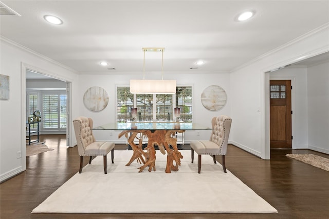 dining room featuring dark wood-style flooring, ornamental molding, recessed lighting, and baseboards