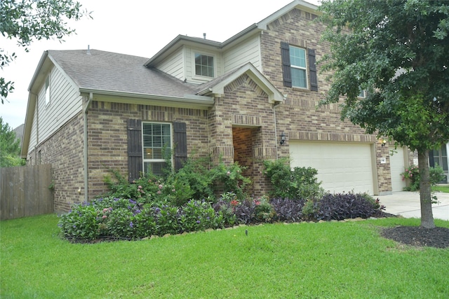 5118 Kingship Ct, Katy, TX 77493 - view of front of house featuring brick siding, driveway, a garage, and a shingled roof