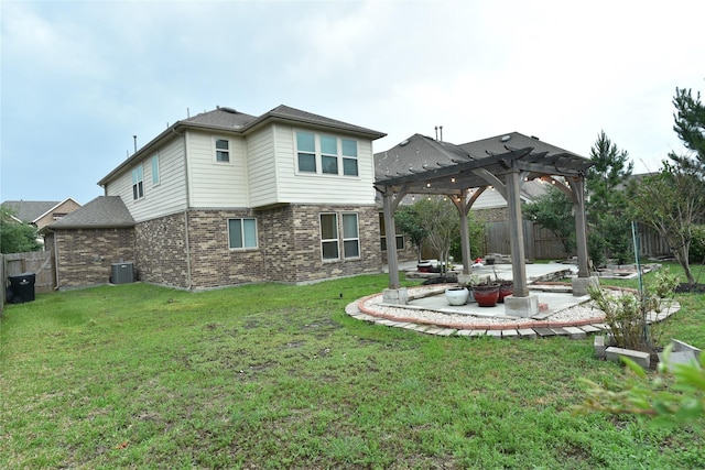 5118 Kingship Ct, Katy, TX 77493 - back of property featuring a pergola, a patio, brick siding, and central air condition unit
