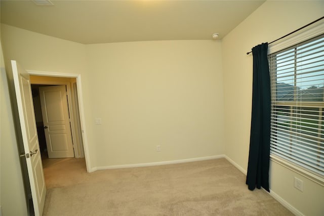 5118 Kingship Ct, Katy, TX 77493 - unfurnished room featuring light carpet, baseboards, and a smoke detector