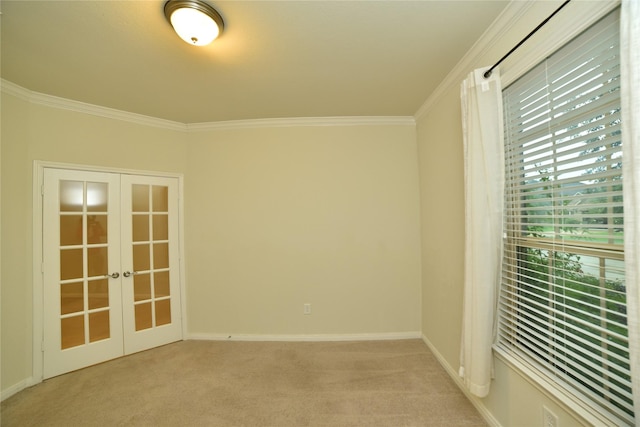 5118 Kingship Ct, Katy, TX 77493 - spare room with french doors, ornamental molding, light carpet, and baseboards