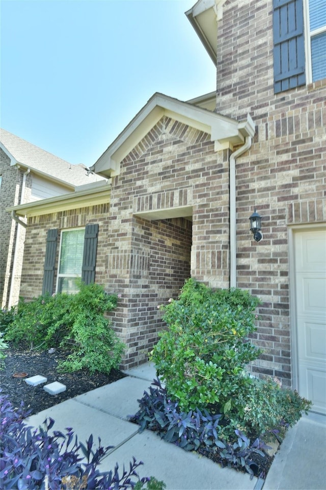 5118 Kingship Ct, Katy, TX 77493 - property entrance featuring brick siding and a garage