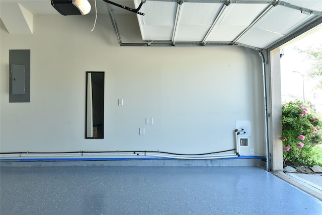 5118 Kingship Ct, Katy, TX 77493 - garage featuring electric panel and a garage door opener