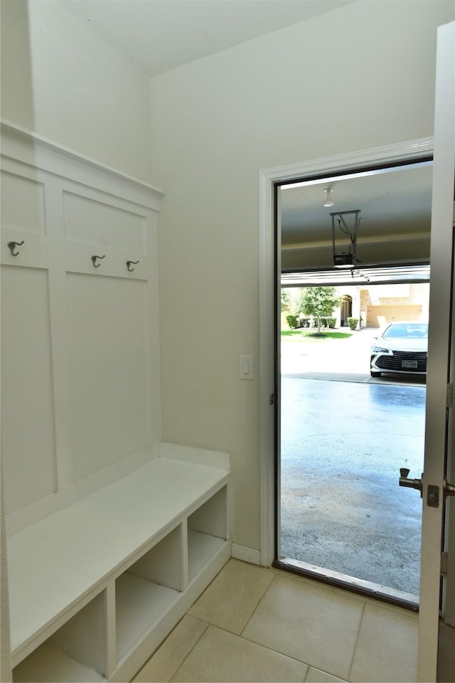5118 Kingship Ct, Katy, TX 77493 - mudroom featuring light tile patterned flooring