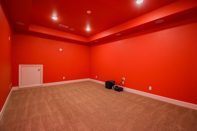 5450 Pudman River Ln, Sugar Land, TX 77479 - spare room featuring carpet floors, baseboards, recessed lighting, and a tray ceiling