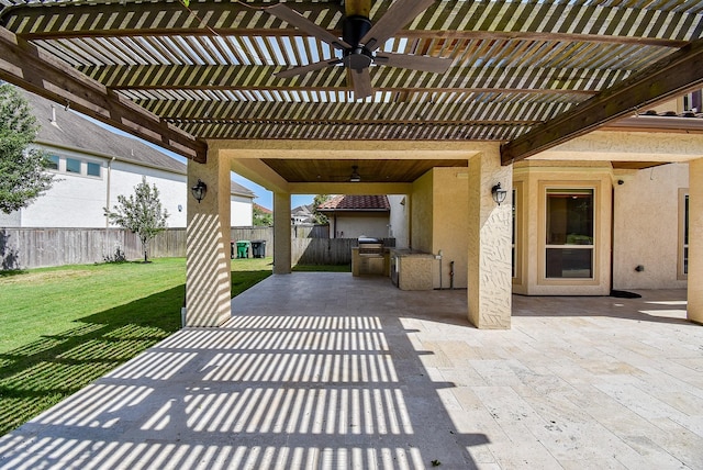5450 Pudman River Ln, Sugar Land, TX 77479 - view of patio with ceiling fan, a pergola, and an outdoor kitchen