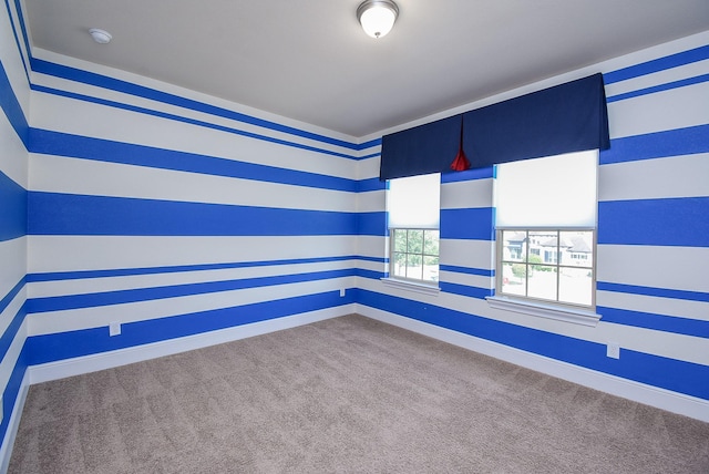 5450 Pudman River Ln, Sugar Land, TX 77479 - carpeted spare room featuring baseboards and a smoke detector