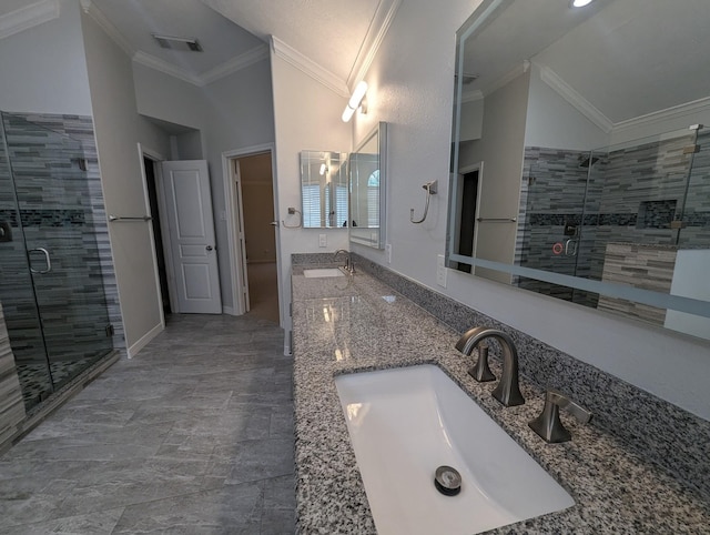 4202 Blue Sage Ter, Spring, TX 77388 - bathroom with lofted ceiling, a stall shower, ornamental molding, and double vanity