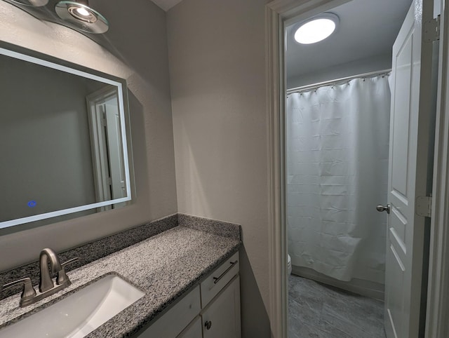 4202 Blue Sage Ter, Spring, TX 77388 - bathroom with vanity, toilet, and a shower with shower curtain
