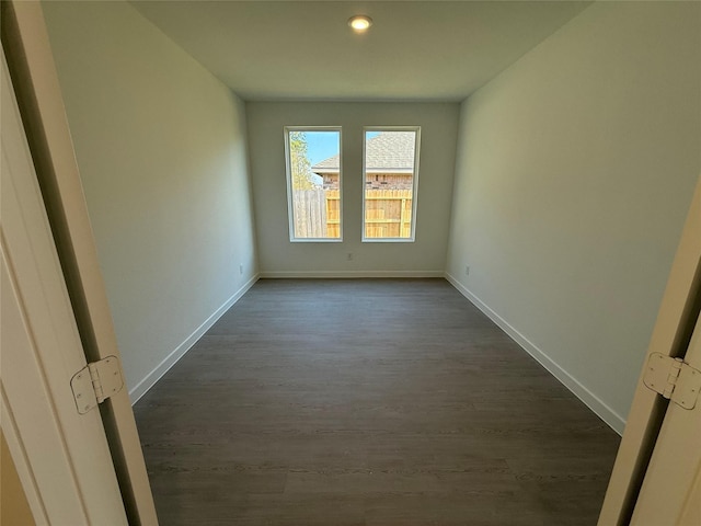 503 Shoreview Dr, Conroe, TX 77303 - spare room featuring dark wood-type flooring, baseboards, and recessed lighting