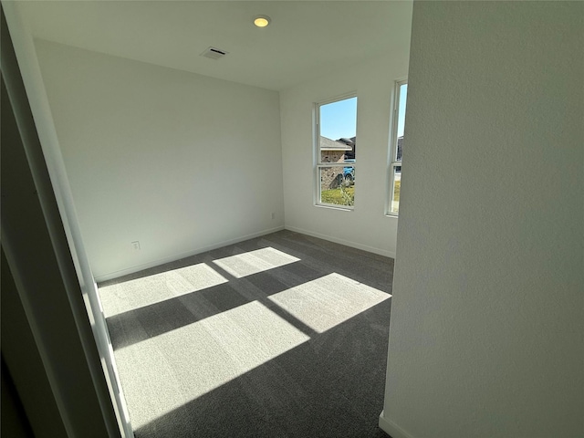 503 Shoreview Dr, Conroe, TX 77303 - spare room with carpet, baseboards, and recessed lighting