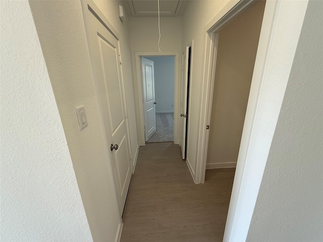 503 Shoreview Dr, Conroe, TX 77303 - corridor featuring attic access, wood finished floors, and baseboards