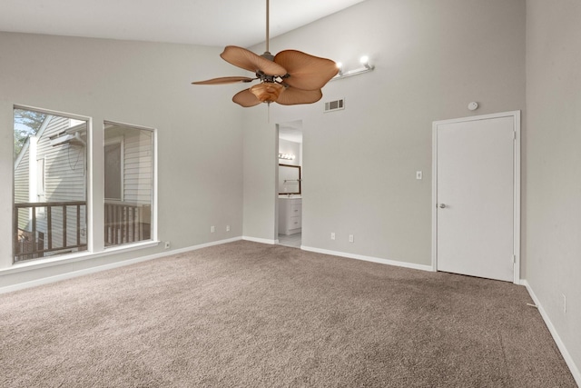 7736 Challie Ln, Houston, TX 77088 - carpeted empty room with ceiling fan, a high ceiling, and baseboards