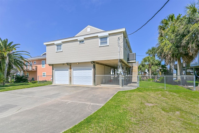 4606 Jamaica Cove Rd, Jamaica Beach, TX 77554 - view of front of home with an attached garage, driveway, and a gate