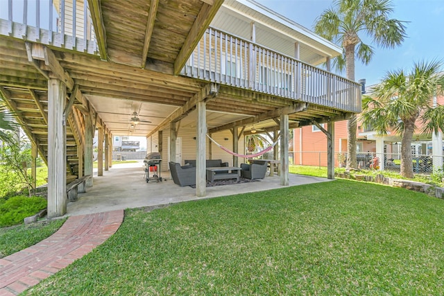 4606 Jamaica Cove Rd, Jamaica Beach, TX 77554 - view of patio / terrace with an outdoor living space, a ceiling fan, stairway, a deck, and a grill