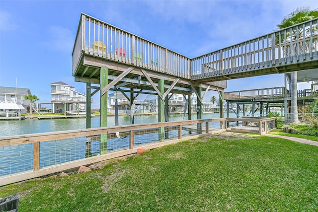 4606 Jamaica Cove Rd, Jamaica Beach, TX 77554 - dock with a water view and a yard