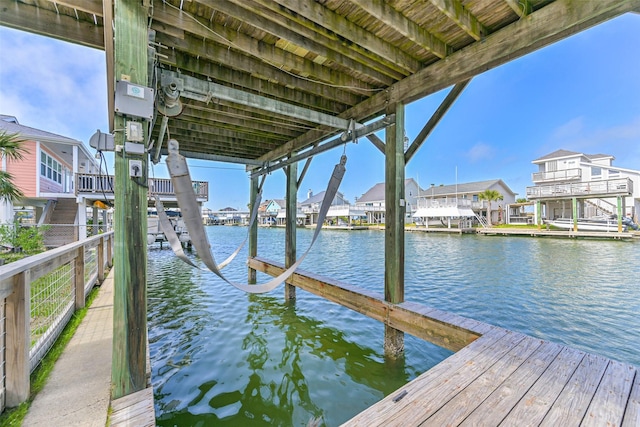 4606 Jamaica Cove Rd, Jamaica Beach, TX 77554 - dock with a water view and a residential view