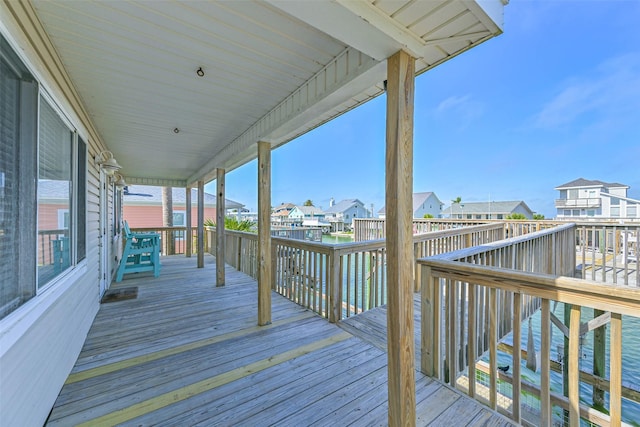 4606 Jamaica Cove Rd, Jamaica Beach, TX 77554 - wooden deck featuring a residential view