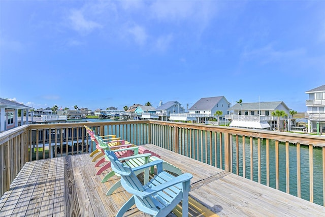 4606 Jamaica Cove Rd, Jamaica Beach, TX 77554 - wooden deck with a residential view and a water view