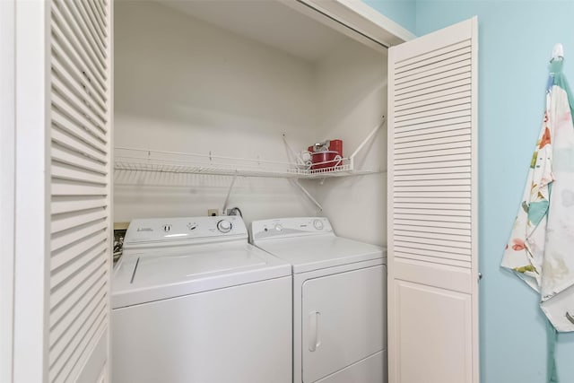 4606 Jamaica Cove Rd, Jamaica Beach, TX 77554 - laundry area featuring washing machine and dryer