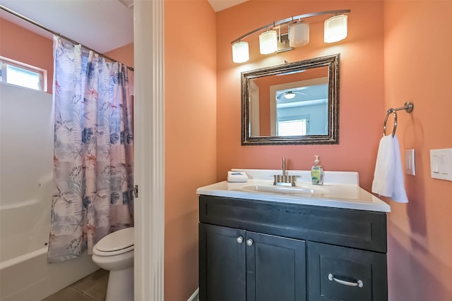 4606 Jamaica Cove Rd, Jamaica Beach, TX 77554 - full bath with tile patterned flooring, vanity, toilet, and shower / tub combo