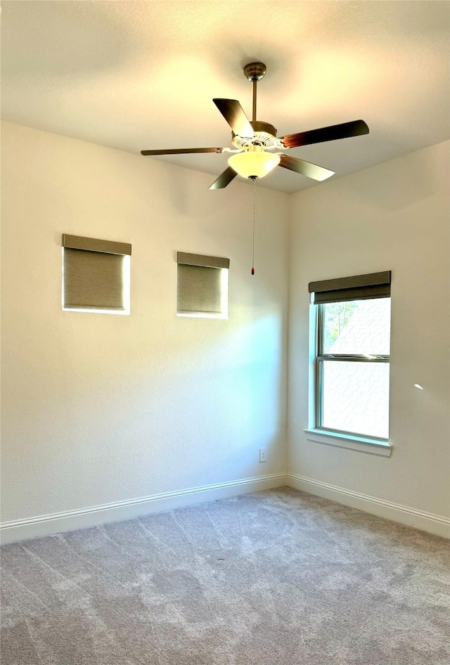 1215 Tallow Park Ln, Pinehurst, TX 77362 - carpeted spare room featuring baseboards and ceiling fan