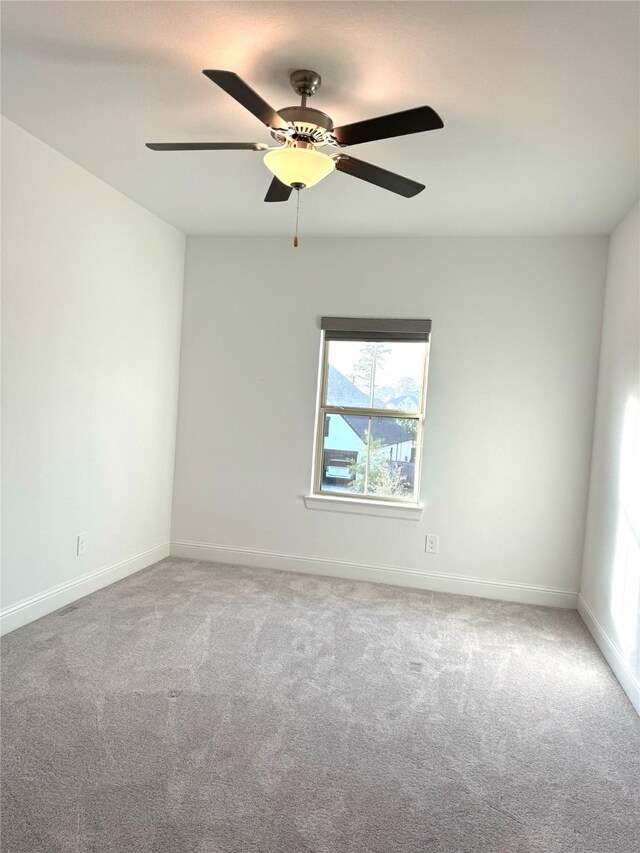 1215 Tallow Park Ln, Pinehurst, TX 77362 - spare room featuring healthy amount of natural light, light carpet, and ceiling fan