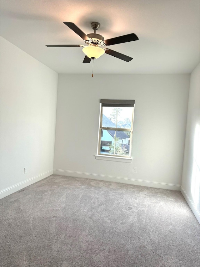 1215 Tallow Park Ln, Pinehurst, TX 77362 - empty room with plenty of natural light, light colored carpet, and ceiling fan