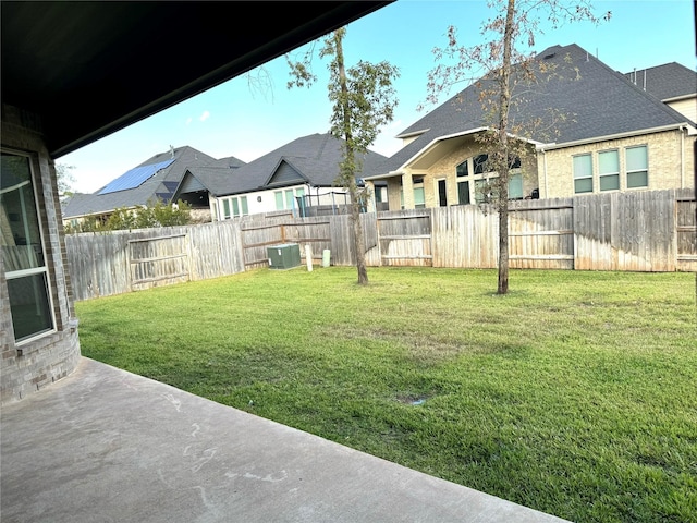 1215 Tallow Park Ln, Pinehurst, TX 77362 - view of yard featuring central AC unit and a patio