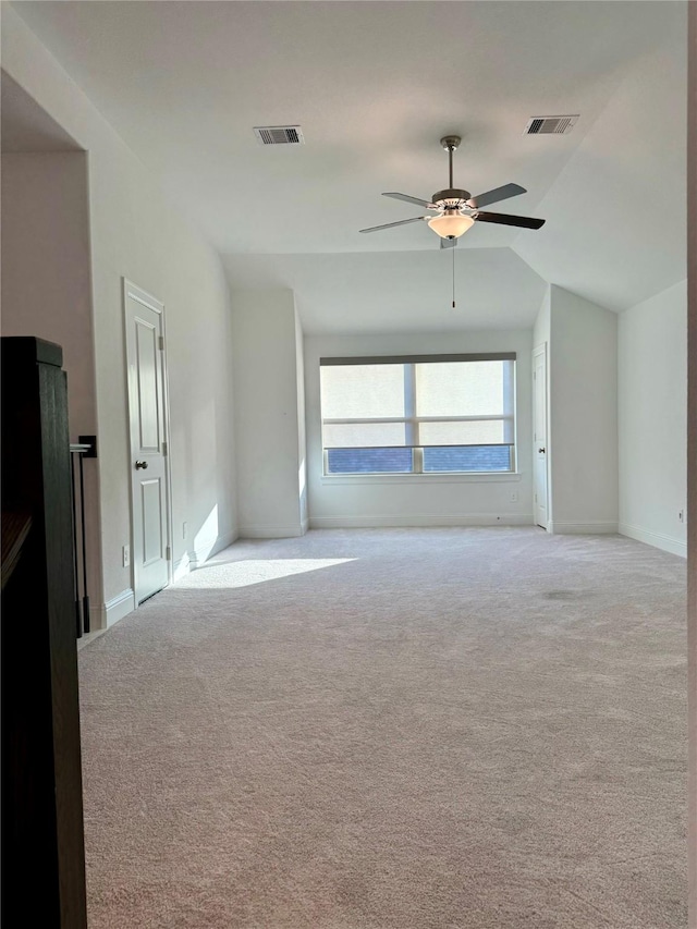 1215 Tallow Park Ln, Pinehurst, TX 77362 - carpeted empty room with vaulted ceiling and a ceiling fan