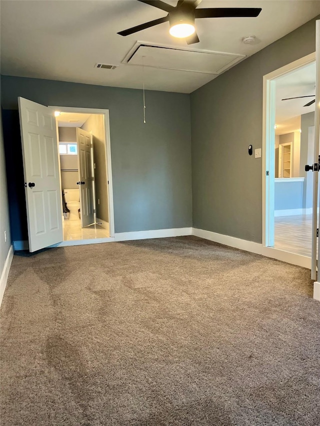 6107 Belmark St, Houston, TX 77033 - unfurnished room with attic access, ceiling fan, baseboards, and carpet