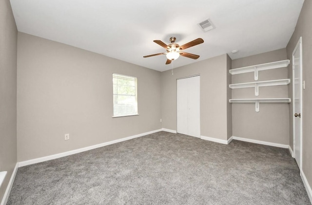 720 Roosevelt St, La Marque, TX 77568 - unfurnished bedroom featuring carpet floors, baseboards, ceiling fan, and a closet