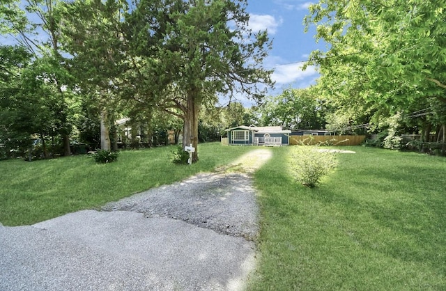 720 Roosevelt St, La Marque, TX 77568 - view of yard featuring driveway
