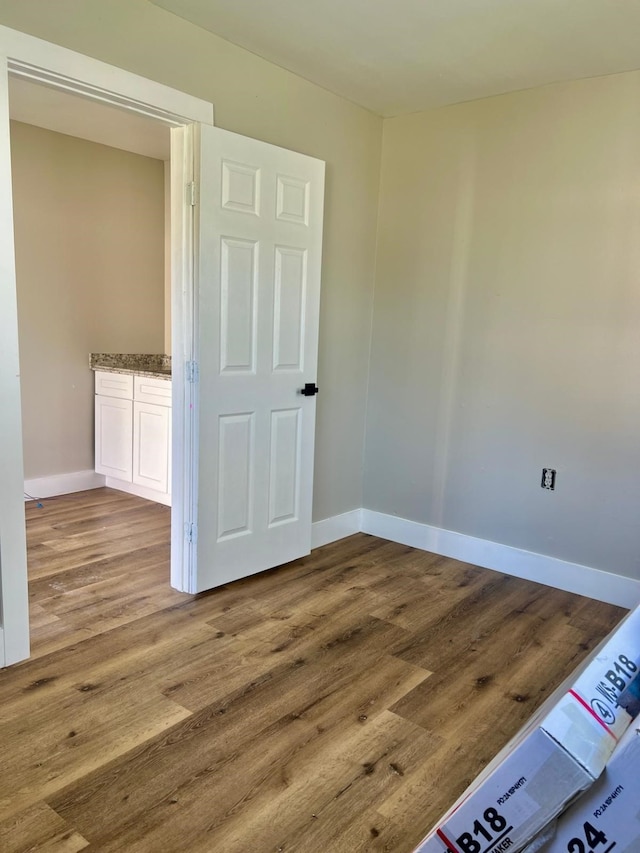 7609 Shotwell St, Houston, TX 77016 - spare room with wood finished floors and baseboards