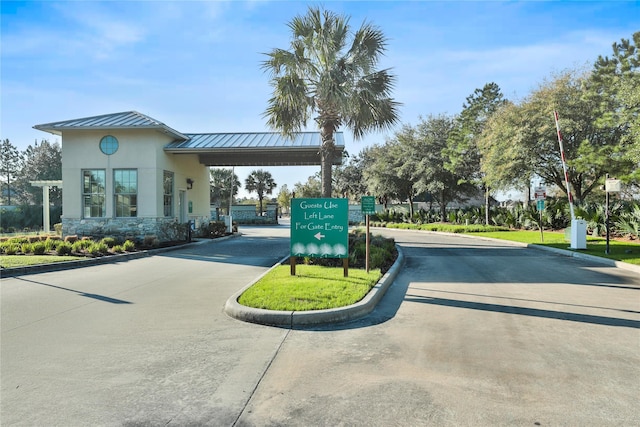10066 Preserve Way, Conroe, TX 77385 - view of concrete road with curbs and traffic signs