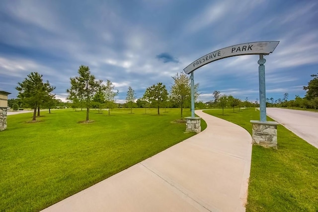 10066 Preserve Way, Conroe, TX 77385 - view of home's community featuring a lawn